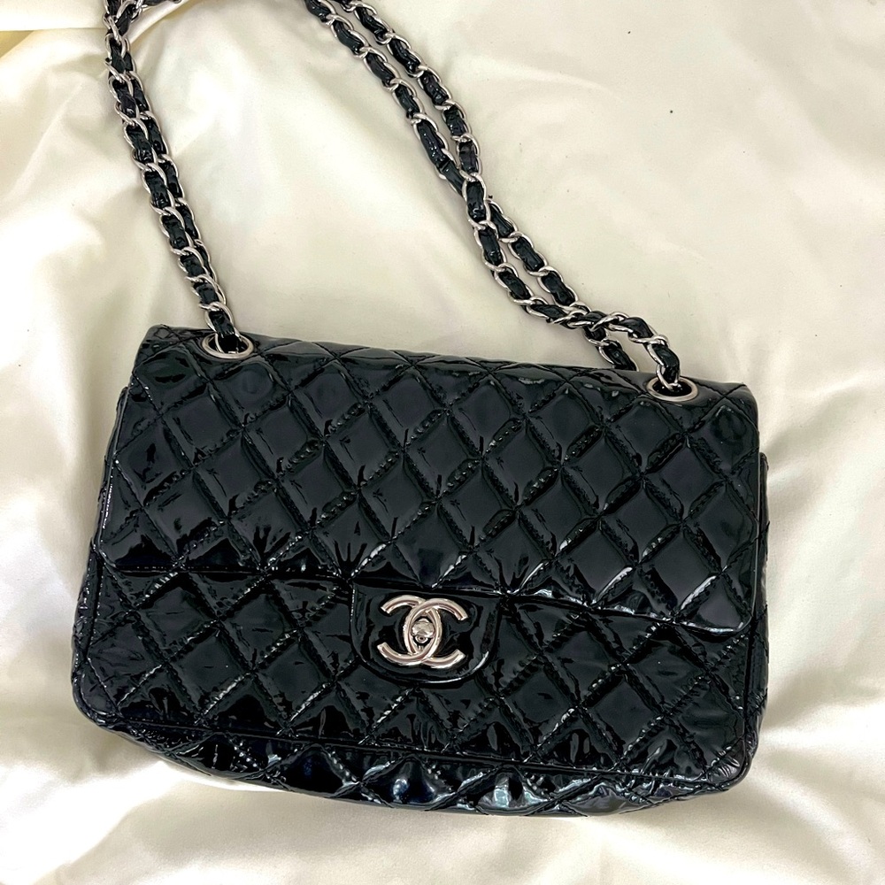 Chanel black leather over the shoulder pocketbook
